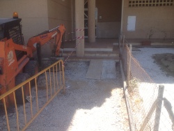 miniexcavadora en comunidad de vecinos